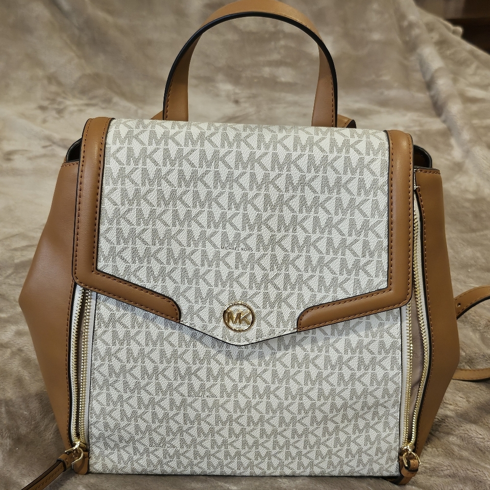NWOT never Worn Michael Kors Tan and Cream Monogram Backpack